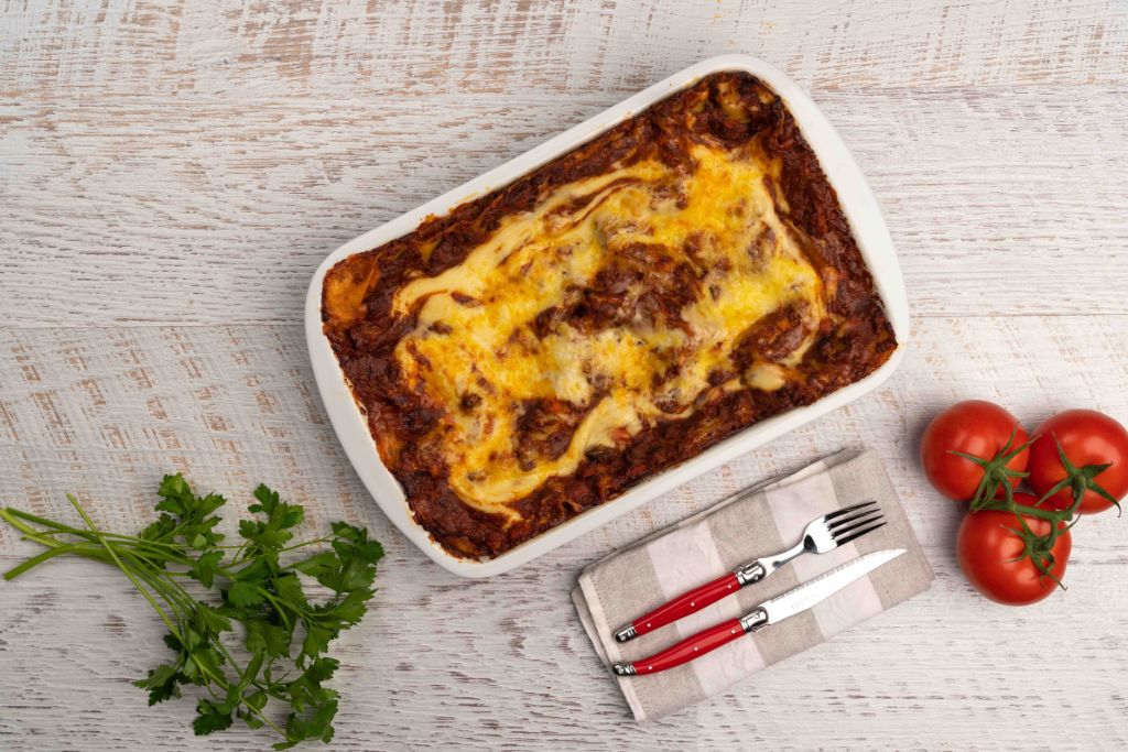 Prepare to impress with our 2kg Beef Ragu Lasagne, a culinary masterpiece serving 4-6.