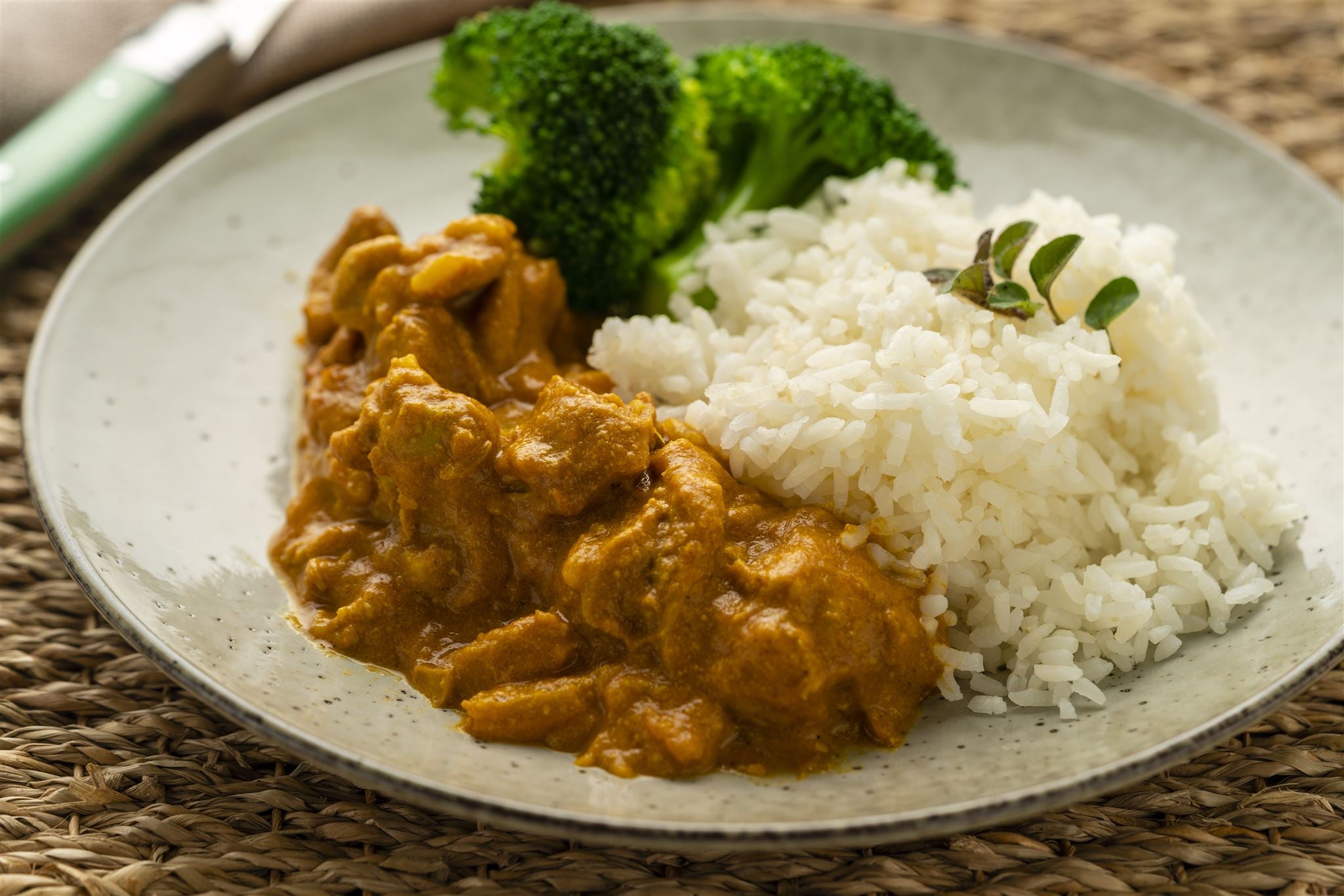 Indulge in the rich colors and flavors of our Butter Chicken curry, a comforting blend of tomato, yogurt, and aromatic spices