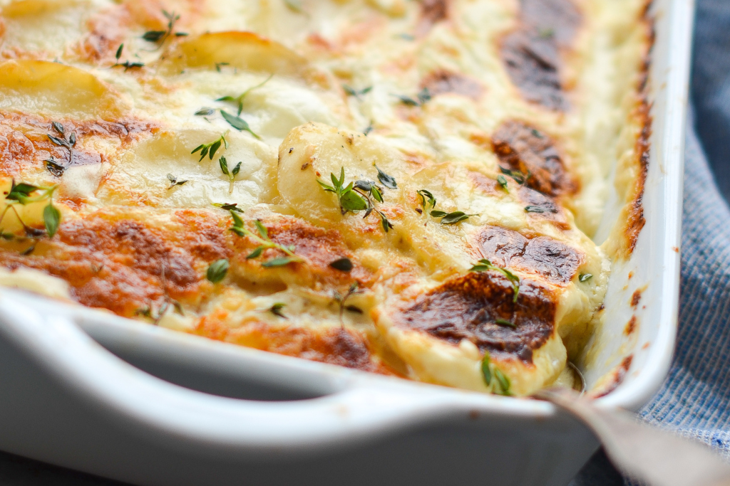 Indulge in the comforting flavors of our 1kg Potato Bake, a creamy delight perfect for serving a crowd.