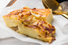 A delectable snapshot of our Potato Bake, a versatile favorite for 2-3 diners, whether it's for a BBQ or a cozy dinner