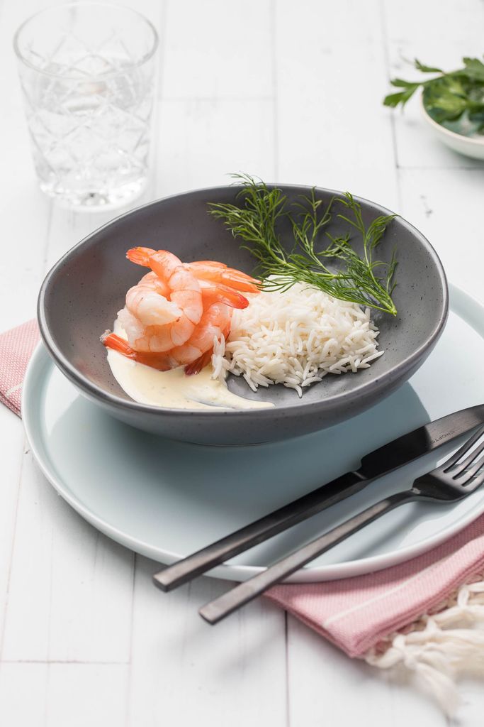 Savor the flavors of our best-selling meal for one: Garlic King Prawns with Steamed Rice, a delightful seafood dish